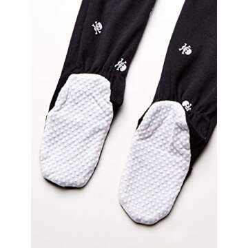 Amazon Essentials Unisex Toddlers' Cotton Snug-Fit Footed Sleeper Pajamas - Discontinued Colors, Black Skull, 4T