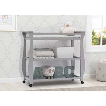Delta Children Lancaster Changing Table with Wheels and Pad