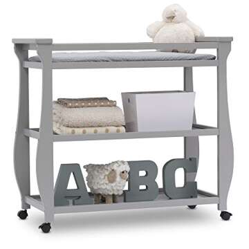 Delta Children Lancaster Changing Table with Wheels and Pad