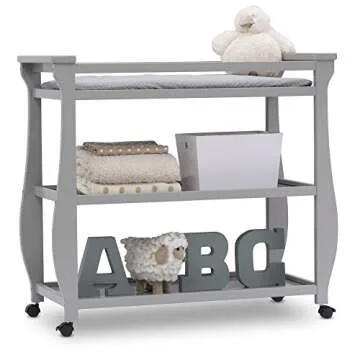 Delta Children Lancaster Changing Table with Wheels and Pad