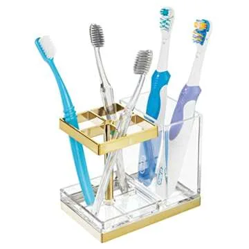 mDesign Plastic Toothbrush and Toothpaste Storage Organizer Holder - Home Decor for Bathroom Countertop - Holds Toiletries and Beauty Accessories - Lumiere Collection - Clear/Soft Brass
