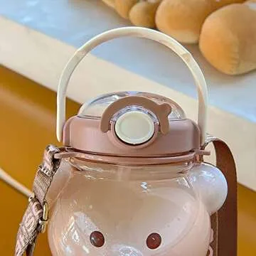 Tuelaly Kawaii Water Bottle Cute Bear Water Bottle with Straw & Strap Large for Women Girls Going out Camping Picnic Hiking School Pink 35 oz(1000 ml)