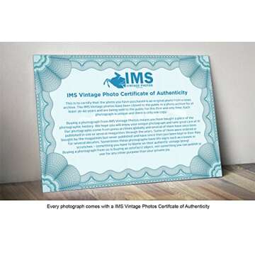 Vintage photo of Carmen Amaya siting and holding a baby.