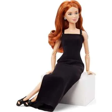 Barbie Basics Model 04 Collector Doll with Red Curly Hair, Black Mini Dress & Boots, Universal-fit Fashions, Posable Petite Body & Swappable Doll Head