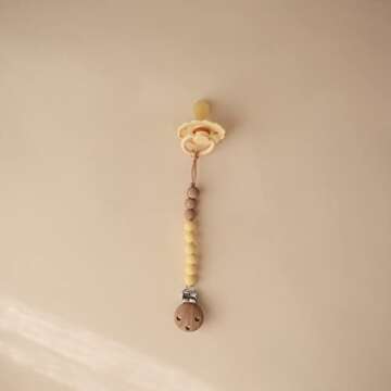 Mushie 100% Silicone Baby Pacifier Clip BPA Free | Eva (Muted Yellow)