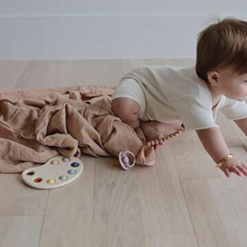 mushie Muslin Baby Swaddle Blanket | 100% Organic Cotton (Blush)