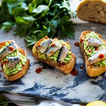 Wild Planet Wild Sardines in Extra Virgin Olive Oil With Lemon, Lightly Smoked, Tinned Fish, 4.4 Ounce (Pack of 12)