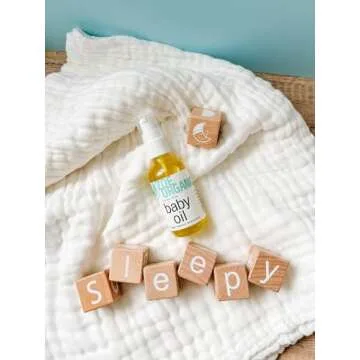 Zoe Organics - Baby Oil, Organic Calming Blend of Nutrient-Rich Oils, Moisturizes Baby’s Delicate Skin, Massage Oil, Calming Blend of Lavender and Chamomile (2 Ounces)