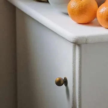 Yanxia Set of 12 -Sleek Round Antique Brass Cabinet Knobs - Retro and Minimalist Hardware for Stylish Home Enhancement - 1 Inch Diameter