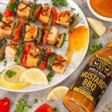 Noble Made Less-Sguar Mustard BBQ Marinade and Dipping Sauce, 13 fl oz Bottle, Mustard BBQ Sauce, Whole30 Approved, Paleo-Certified, Keto, and Gluten-Free, Gold BBQ Sauce with 0g of Fat