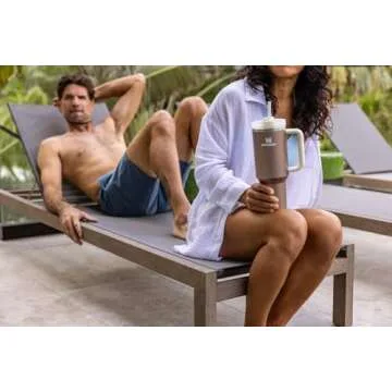 Stanley Quencher H2.0 FlowState Stainless Steel Vacuum Insulated Tumbler with Lid and Straw for Water, Iced Tea or Coffee, Smoothie and More, Rose Quartz Glow, 40 oz