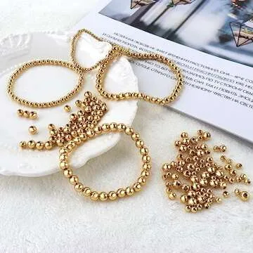 MAPOIEU 260pcs 18K Gold Filled Spacer Round Beads,Seamless Smooth Metal Round Beads,Gold Filled Solid Brass Beads for DIY Bracelet Necklace Earring Jewelry Making (3MM)