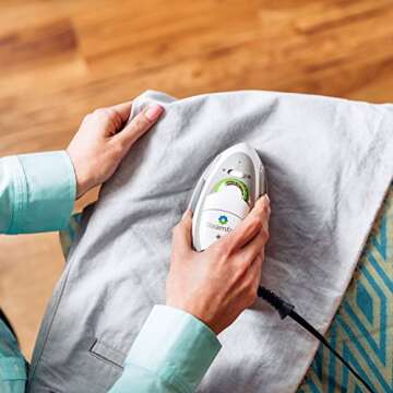 SteamFast SF-750 Mini Steam Iron with Dual Voltage, Travel Bag, Rapid Heating, 1000 Watts, Handheld, White