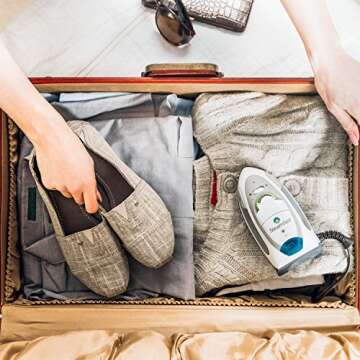 SteamFast SF-750 Mini Steam Iron with Dual Voltage, Travel Bag, Rapid Heating, 1000 Watts, Handheld, White