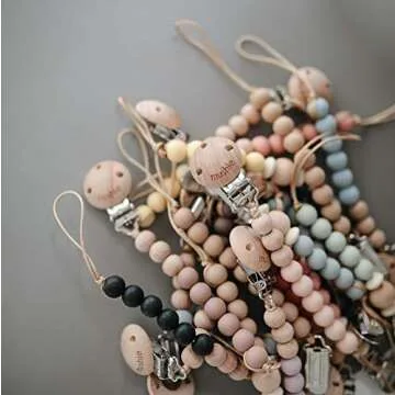 Cleo Pacifier Clip in White for Stylish Baby Essentials