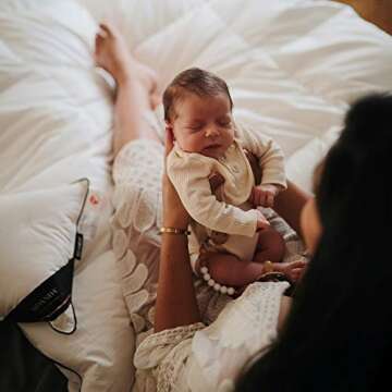 Cleo Pacifier Clip in White for Stylish Baby Essentials