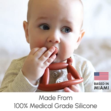 Smooch Amber Infused Rocking Baby Teething Toy for 0-18 Months.