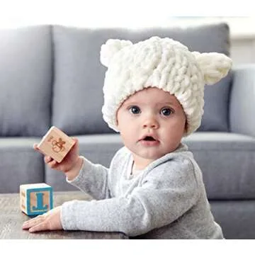 Finger Looping: Knitting Without Needles, Complete step-by-step instructions and Collection of More Than 15 Stylish Blankets, Scarves, Cowls, and Pillows.