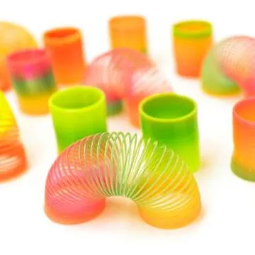 Super Z Outlet Classic Novelty Colorful Rainbow Neon Plastic Spring Toy for Birthday Party Favors, Bag Fillers, Gift (12 Pack)