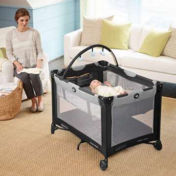 Graco Pack 'N Play On The Go Playard, Kagen with Reach-through Bassinet and Compact Fold