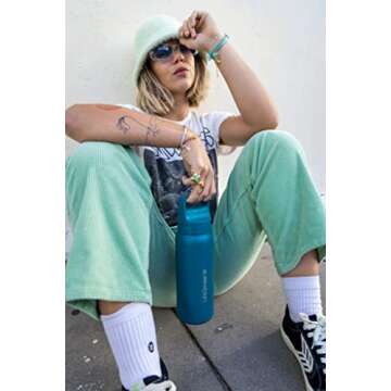 LifeStraw Go Series — Insulated Stainless Steel Water Filter Bottle for Travel and Everyday Use Removes Bacteria, Parasites and Microplastics, Improves Taste, 24oz Laguna Teal