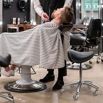 TASALON Saddle Stool - Ergonomic Saddle Chair - Comfortable Saddle Stool with Wheels - Swivel Salon Cutting Stool for Kitchen, Salon, Spa, Tattoo, Pedicure, Massage -Esthetician Chair – Black