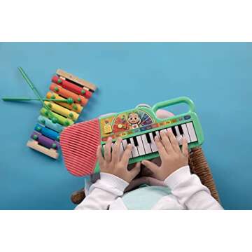 CoComelon First Act Musical Keyboard, 23 Keys; Music and ABC Songs Pre-Recorded, Educational Music T...