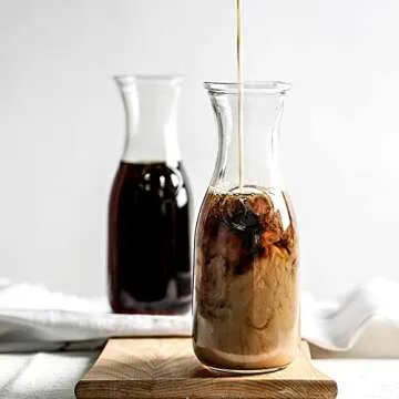 Kingrol 4 Pack Glass Pitchers, 34 Ounces/1 Liter Narrow Neck Glass Carafes for Water, Juicing, Iced Tea, Beverage, Wine, Mimosa Bar Supplies