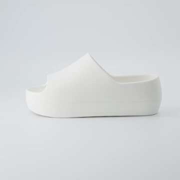 CUSHIONAIRE Harrison Platform Slippers | Women’s EVA Pillow Cloud Slides | Waterproof Shower Shoes...