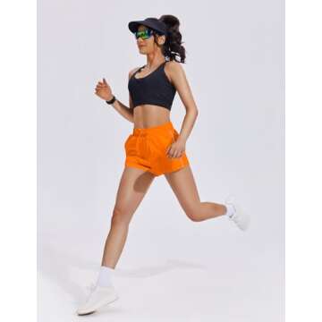 PINSPARK Running Shorts for Women Quick Dry Athletic Short Elastic High Waisted Active Wear with Zip Pockets, Orange, Medium