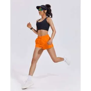 PINSPARK Running Shorts for Women Quick Dry Athletic Short Elastic High Waisted Active Wear with Zip Pockets, Orange, Medium