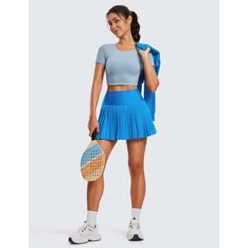 CRZ YOGA Women's High Waisted Pleated Tennis Skirts with Pockets Tummy Control Casual Liner A Line Workout Golf Skorts Madagascar Blue Medium
