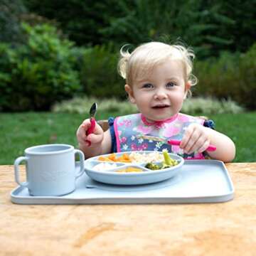 green sprouts Finger Food Platemat Spacious eating and craft area with raised edges contains messes Helps develop independent eating skills, Great for crafts, Made of silicone, Dishwasher safe