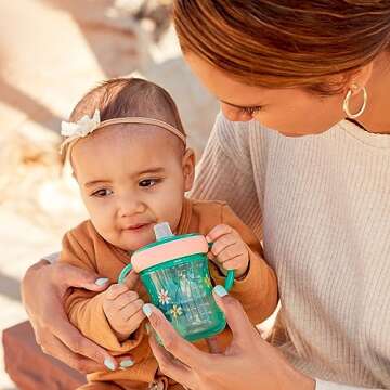 The First Years - Soft Spout Sippy Cup - Toddler Trainer Cup for 6+ Months -with Handles and Leak Proof Lid - 7 Oz - Floral Ladybug Print - 2 Count