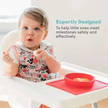ezpz Mini Bowl for 12 Months+ (Coral) - 100% Silicone Suction Bowl with Built-in Placemat for Toddlers - Comes with a Reusable Travel Bag