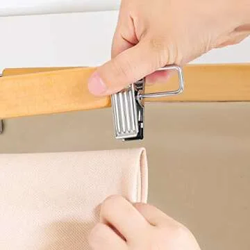 SONGMICS Wooden Pants Hangers 12 Pack, Pants Hangers with Clips, Adjustable Anti-Rust Metal Clips, 360° Swivel Hook, Skirt Hangers for Pant, Skirts, Natural Grain UCRW008-12