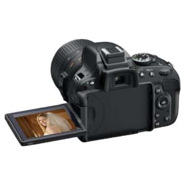 Nikon D5100 DSLR Camera with 18-55mm f/3.5-5.6 Auto Focus-S Nikkor Zoom Lens (OLD MODEL)