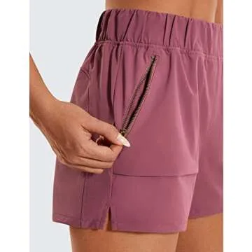 CRZ YOGA Women's Waterproof Stretch Hiking Shorts Mid Rise Summer for Outdoor Golf Workout with Zip Pockets Belt - 3'' Misty Merlot Small