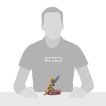 Enesco Disney Traditions by Jim Shore Peter Pan Tinker Bell Sitting on Heart Figurine, 5 Inch, Multicolor