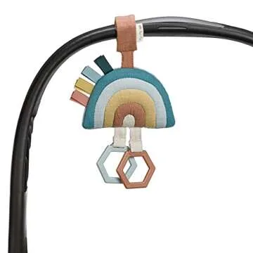 Itzy Ritzy Jingle Travel Toy for Stroller, Car Seat or Activity Gym - Baby Hanging Toy Features Jingle Sound, Clinking Rings & Adjustable Attachment Loop (Rainbow)