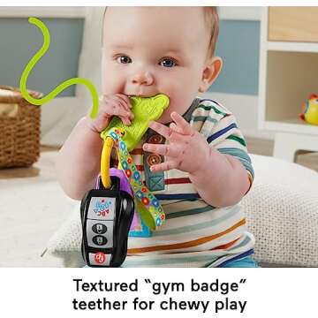 Fisher-Price Baby Travel Toy Laugh & Learn Play & Go Activity Keys with Learning Music, Teether & Mirror for Infants Ages 6+ Months