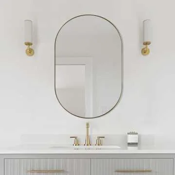ANDY STAR Gold Oval Mirror, Brass Mirror for Wall, Oval Mirrors for Bathroom in Stainless Steel Metal 1’’ Thin Frame Pill Shaped Mirror Hangs Vertical or Horizontal Ideal for Limited Space