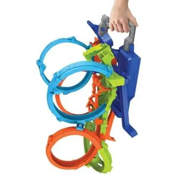 Hot Wheels Track Set with 4 Loops, 3-Way Crash Zone & Motorized Booster, Folds for Storage, with 1:64 Scale Toy Car