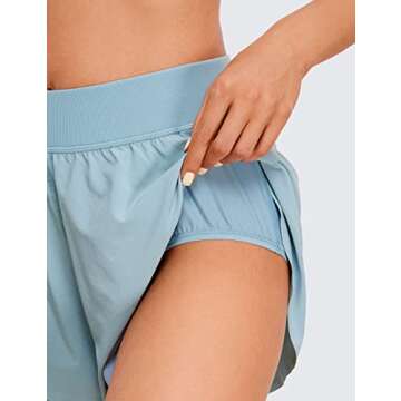 CRZ YOGA Mid Waisted Dolphin Athletic Shorts for Women 4" Lightweight High Split for Gym Workout with Liner Quick Dry Light Grayish Blue X-Large