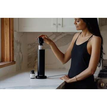 AromaTech New AroMini BT Plus Scent Diffuser w/Bluetooth – Cold-Air Diffusion Scent Machine for Home, Office, Hotel, Spa – Nebulizing Diffusion System for Essential Oil Blends (Black)