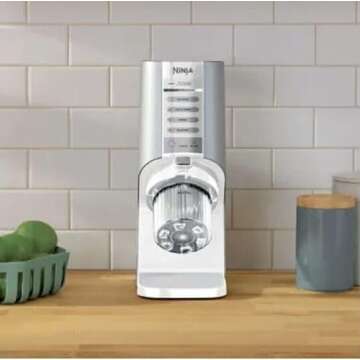 Ninja NC100 CREAMi Breeze 5-in-1 Ice Cream & Frozen Treat Maker, for Ice Cream, Gelato, Sorbet, Milkshakes, Smoothie Bowls & More, 5 One-Touch Programs, (2) Pint Containers & Lids, Perfect for Adults