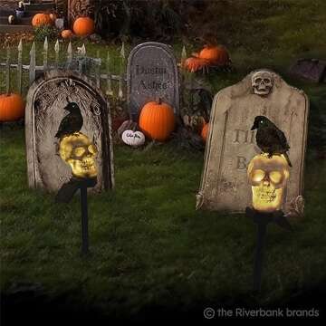 the Riverbank Brands Scary Glowing Skull & Crow Solar Pathway Lights with Glow in The Dark Eyes, Creepy Outdoor Halloween Decorations, Set of 2 Pathway & Driveway Markers