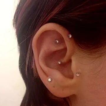 Swarovski Crystal Ear Pellets: 60 self-adhesive 24 Karat gold plated ear pellets (ear seeds) made with crystals from Swarovski.