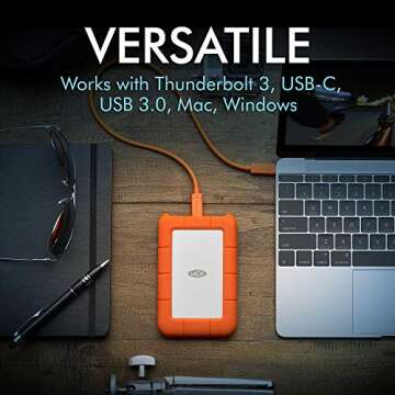 LaCie Rugged USB-C 2TB External Hard Drive Portable HDD – USB 3.0 compatible, Drop Shock Dust Rain Resistant, for Mac and PC Computer Desktop Workstation Laptop, 1 Month Adobe CC (STFR2000800)