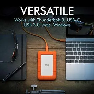 LaCie Rugged USB-C 2TB External Hard Drive Portable HDD – USB 3.0 compatible, Drop Shock Dust Rain Resistant, for Mac and PC Computer Desktop Workstation Laptop, 1 Month Adobe CC (STFR2000800)